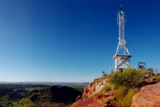 Digital connectivity tower at the top of a hill