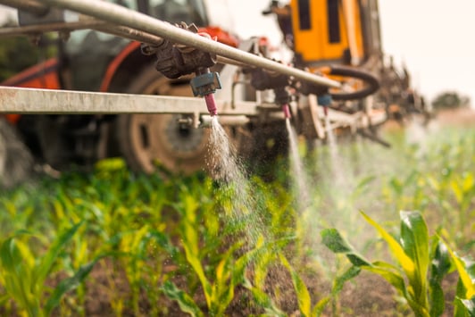 Close up of spray nozzle on crop sprayer