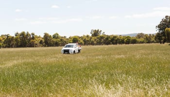 Farm vehicle in field