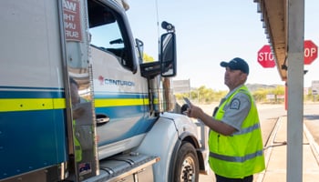 DPIRD quarantine WA inspector talking to truck driver at Kimberley checkpoint
