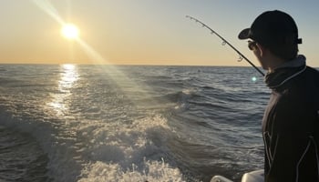 Person fishing from boat