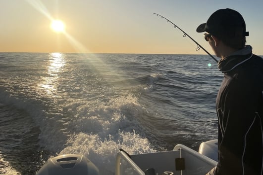 Person fishing from boat