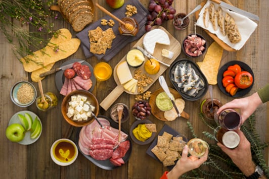 Overhead view of a large group of local food and beverage produce