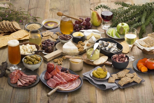 Overhead view of a large group of local food and beverage produce