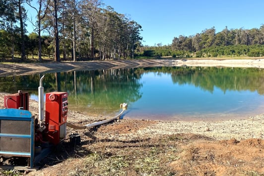 Image of a lake as water supply for an orchard