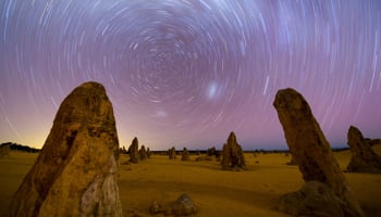 Long exposure image of the Pinnacles with the night sky and stars moving