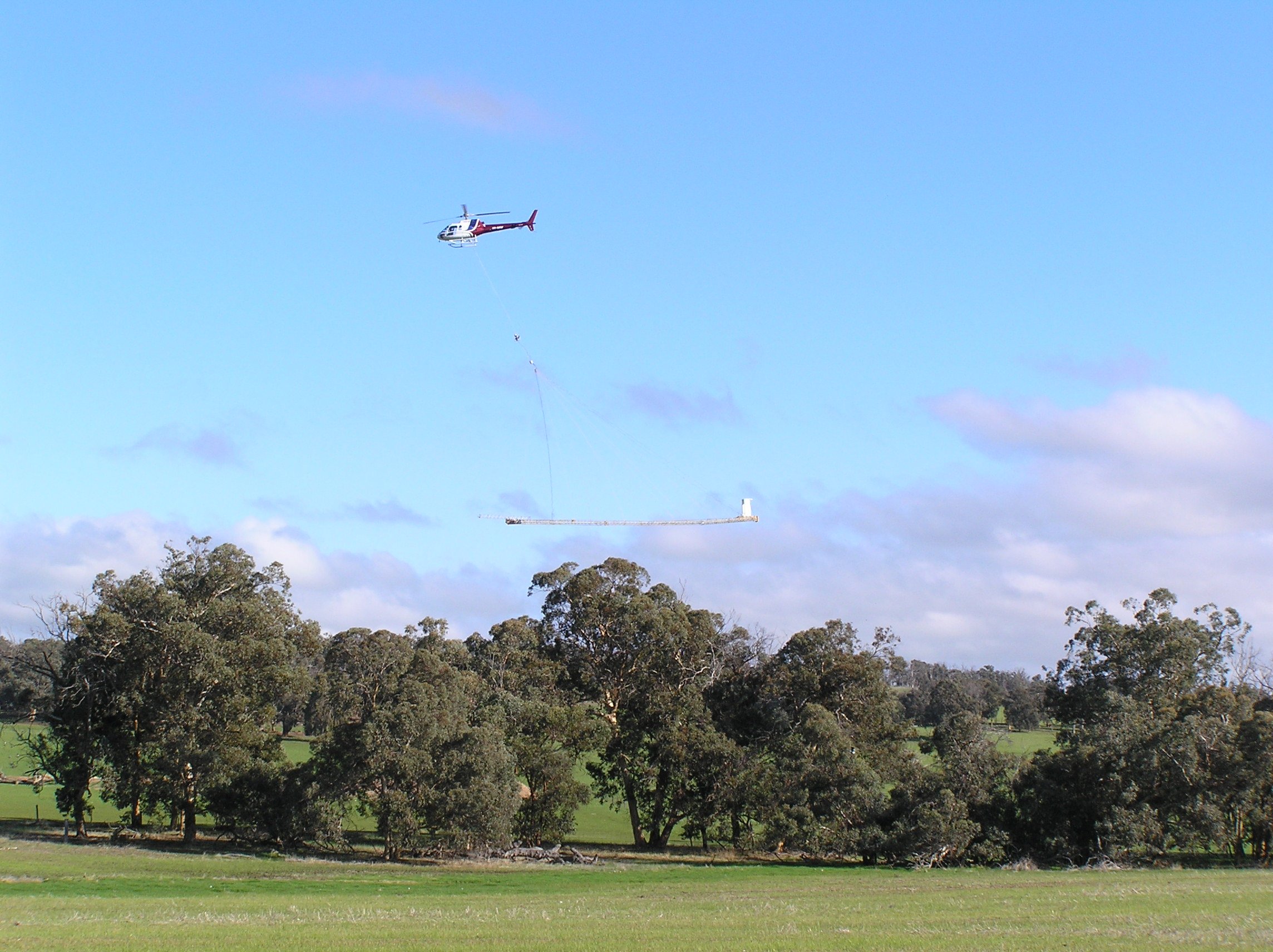 Flying aeroplane dangling a pentagon